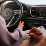 woman taking her driver s license test vehicle 1 1 1